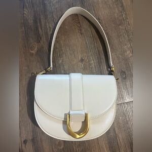 Charles and Keith Gabine Leather Saddle Bag in Oat